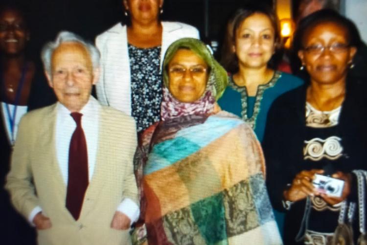 Dr. Denis Parsons Burkitt's family with Department staff