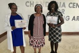 Dr Waweru with the awardees Ms Githui and Ms Kimilu 